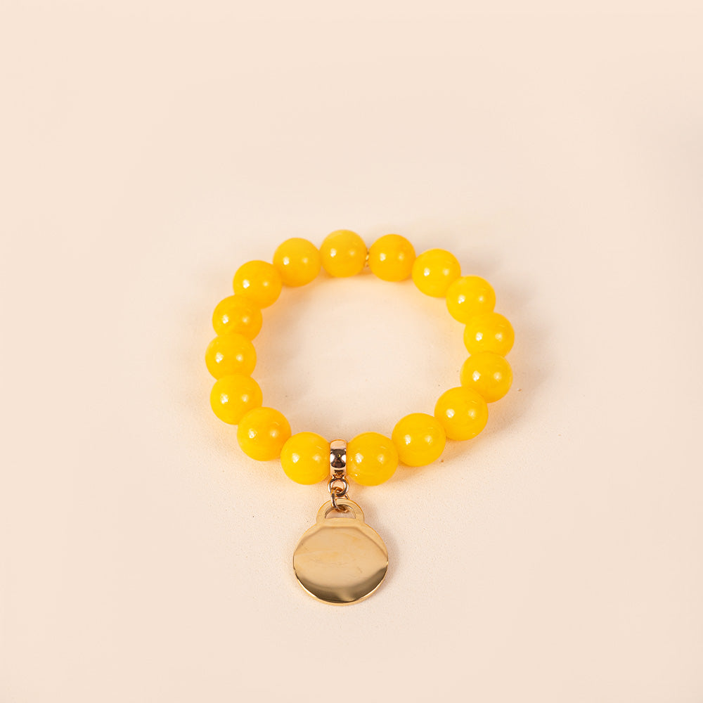 BRACCIALE ELASTICO CON PIETRE COLORATE E CIONDOLO
