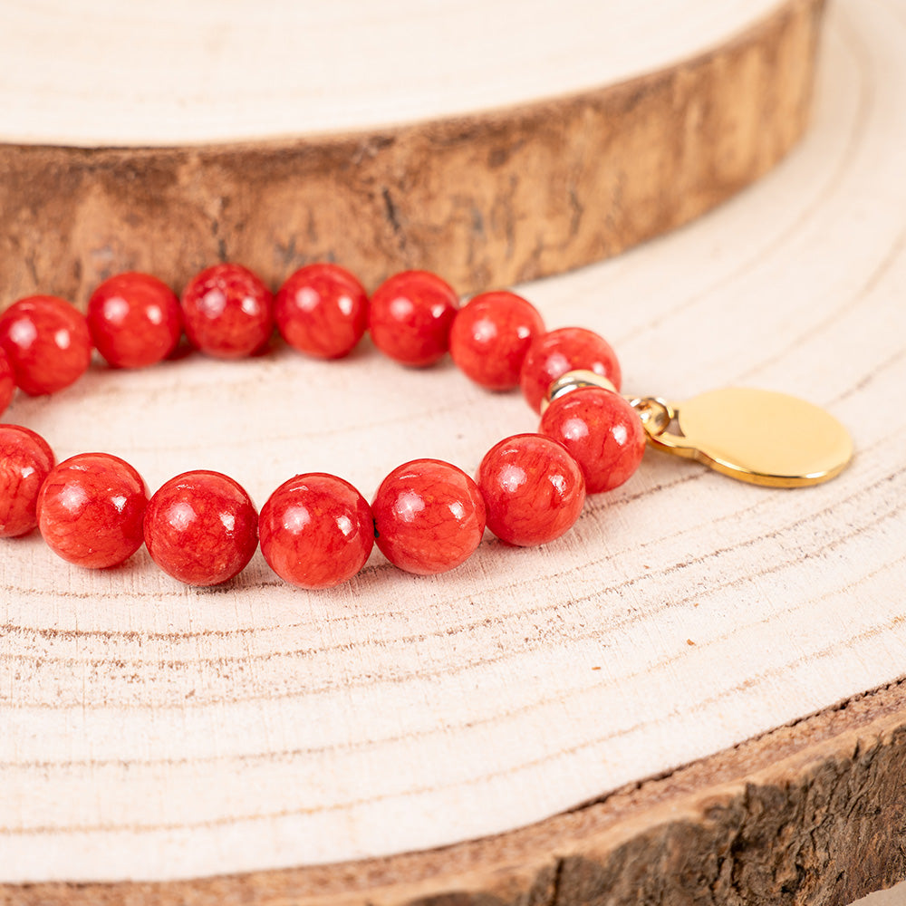 BRACCIALE ELASTICO CON PIETRE COLORATE E CIONDOLO