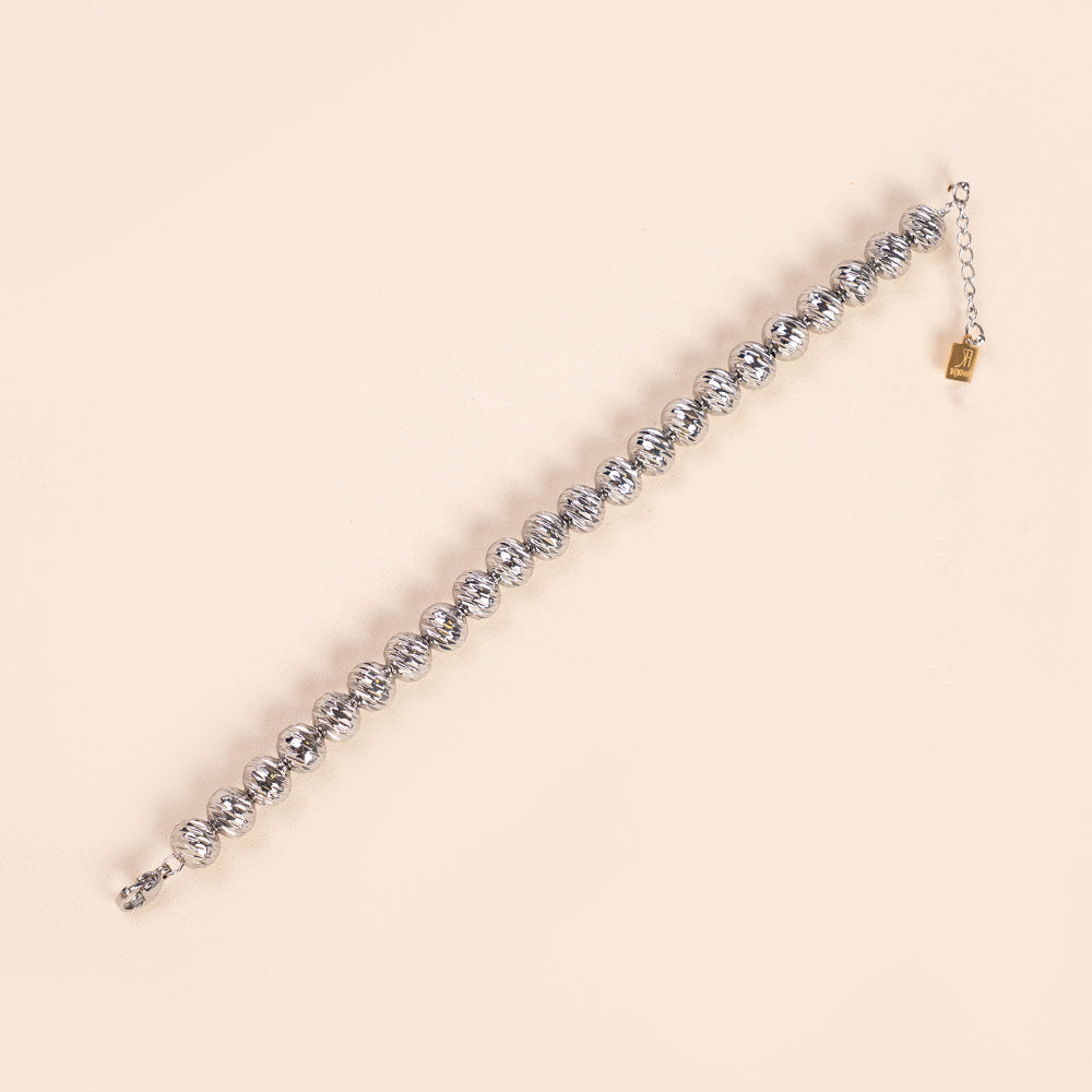 BRACCIALE CON SFERE RIGATE