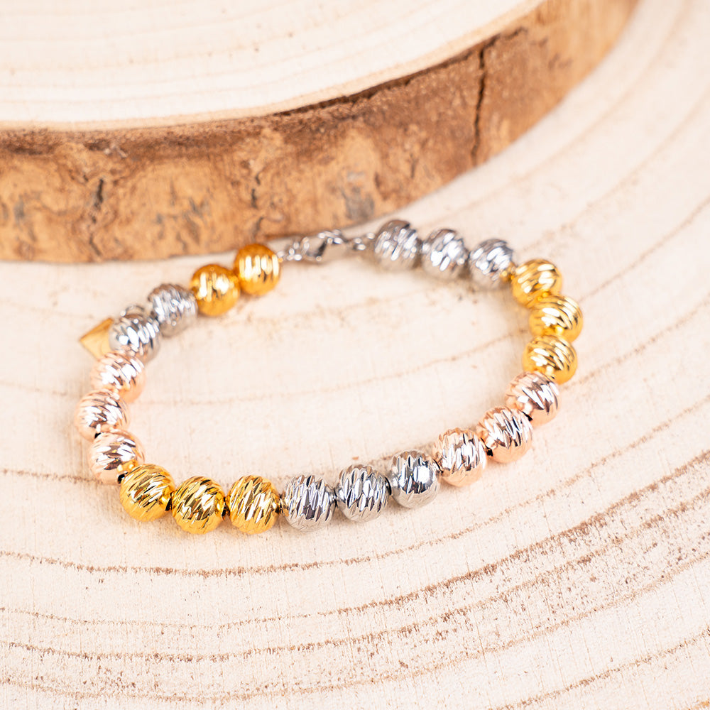 BRACCIALE CON SFERE RIGATE A COLORI ALTERNATI