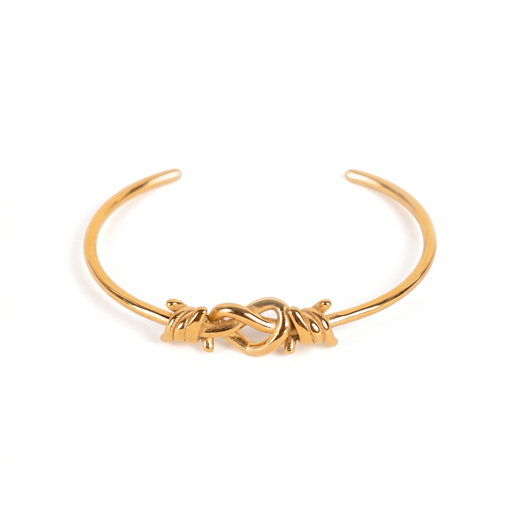 RIGID BRACELET WITH BARBED WIRE AND HEART KNOT