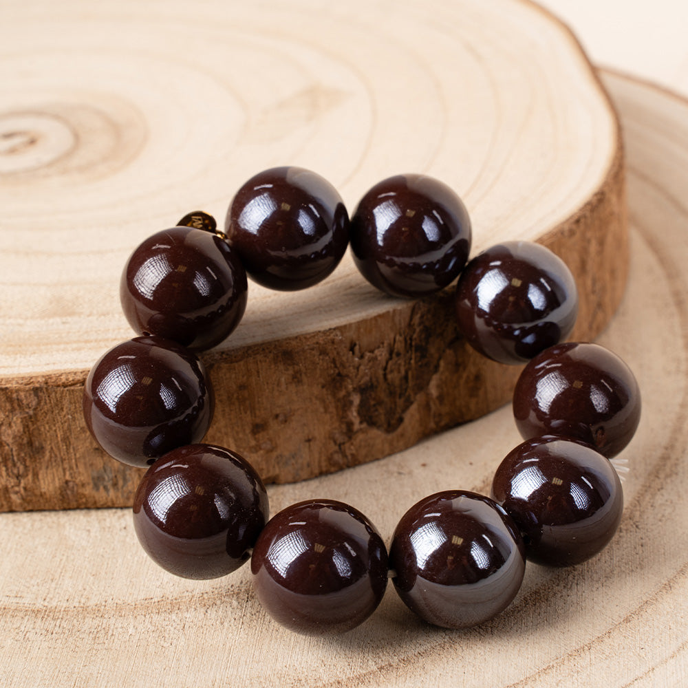 BRACCIALE ELASTICO CON SFERE COLORATE