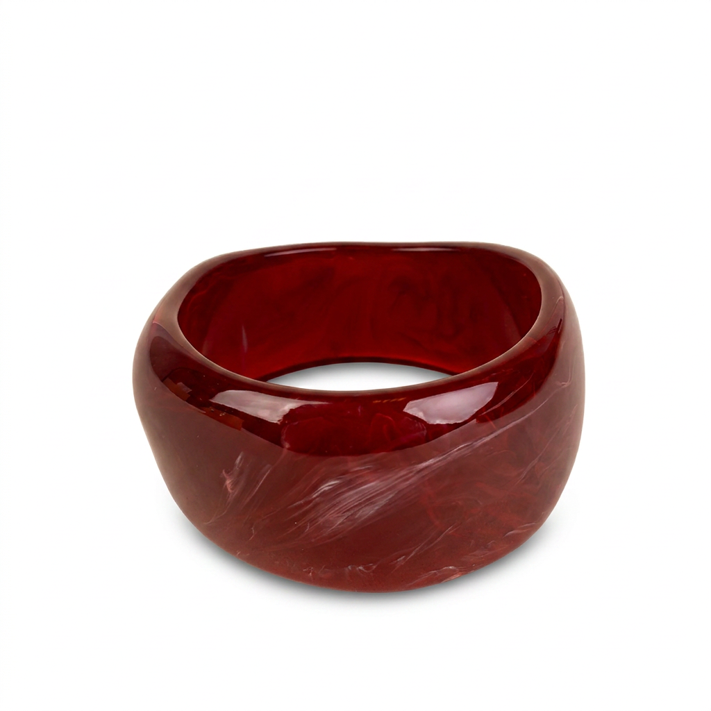 BRACCIALE RIGIDO ASIMMETRICO IN RESINA COLORATA