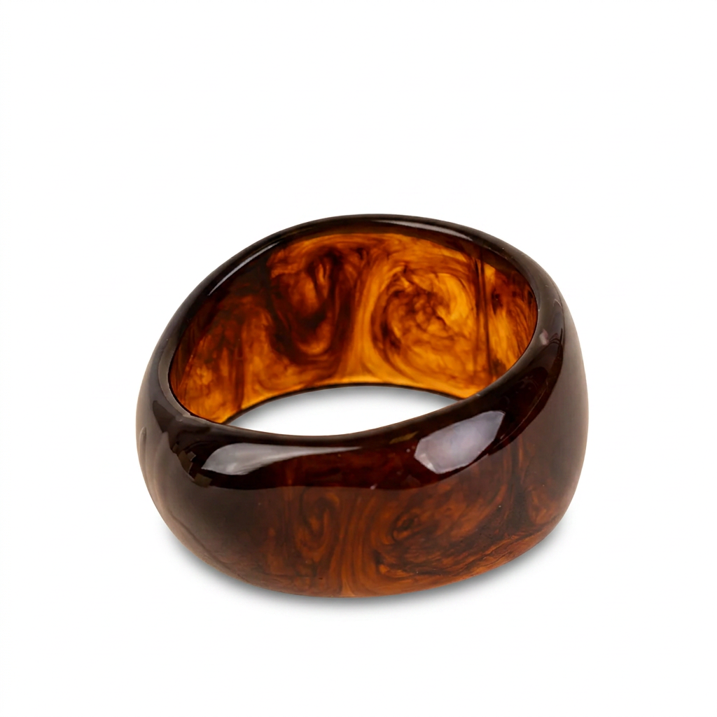 BRACCIALE RIGIDO ASIMMETRICO IN RESINA COLORATA