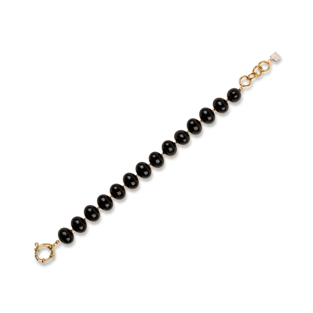 BRACCIALE CON PERLE OVALI LUCIDE INTERVALLATE DA PUNTI DORATI