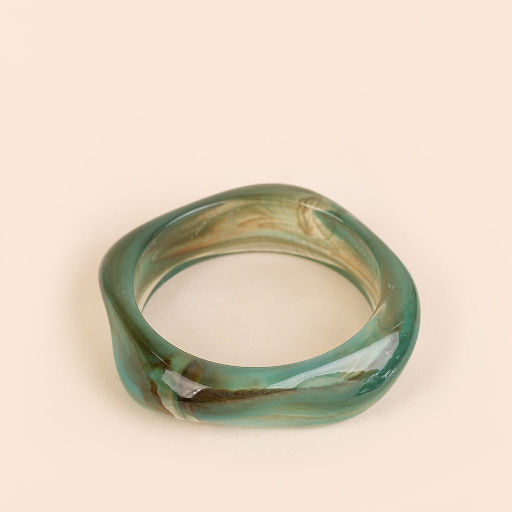 BRACCIALE RIGIDO ASIMMETRICO IN RESINA SFUMATA