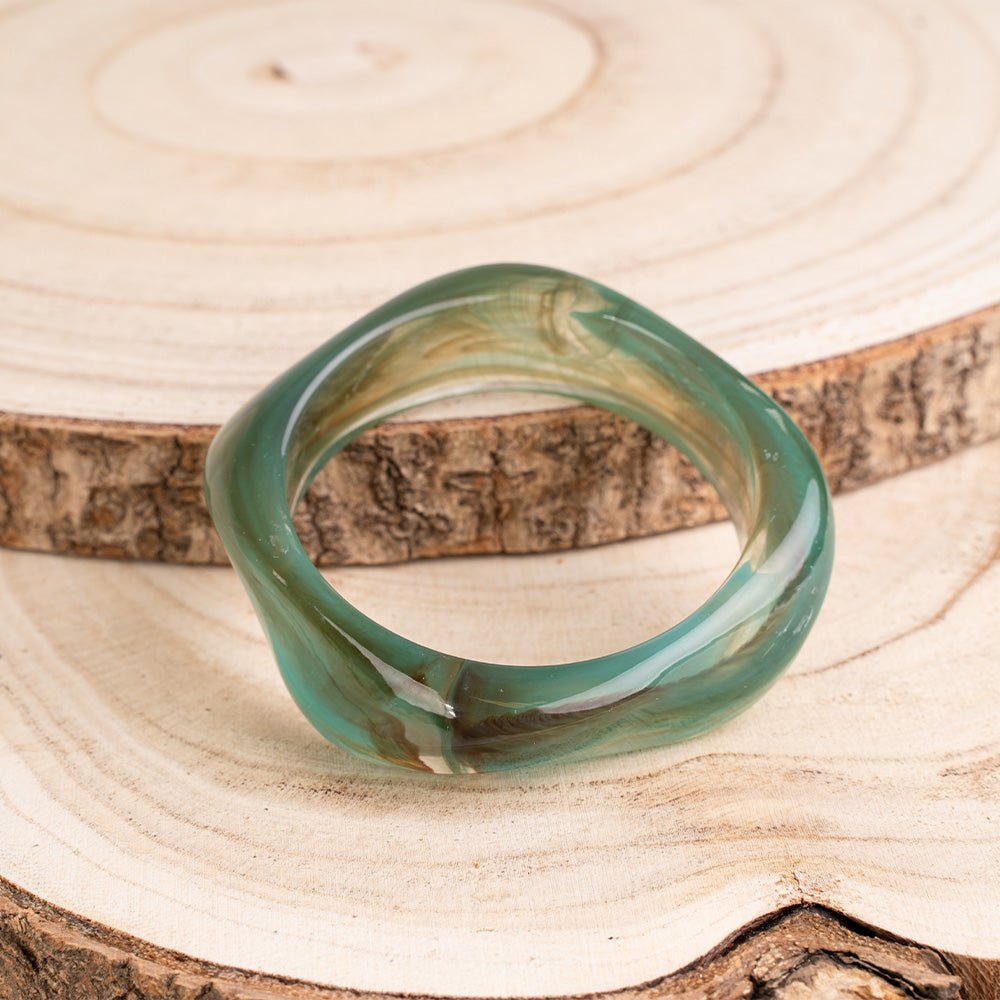 BRACCIALE RIGIDO ASIMMETRICO IN RESINA SFUMATA