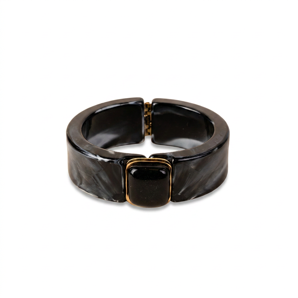 BRACCIALE RIGIDO IN RESINA CON APERTURA A MOLLA E PIETRA CENTRALE