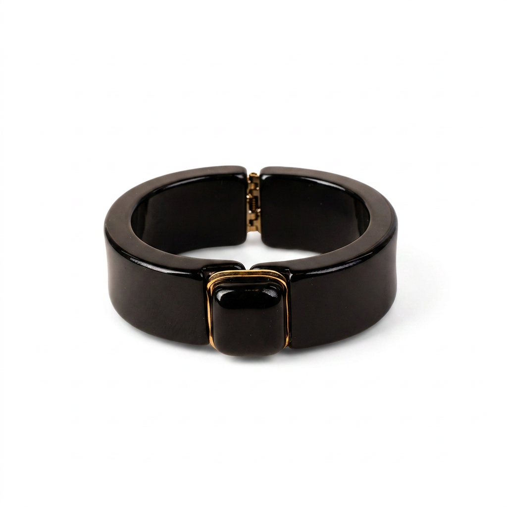 BRACCIALE RIGIDO IN RESINA CON APERTURA A MOLLA E PIETRA CENTRALE