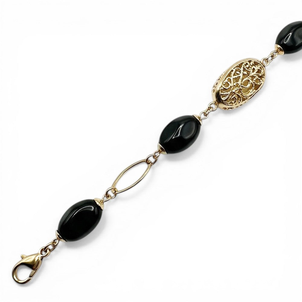 BRACCIALE CON DETTAGLI TRAFORATI