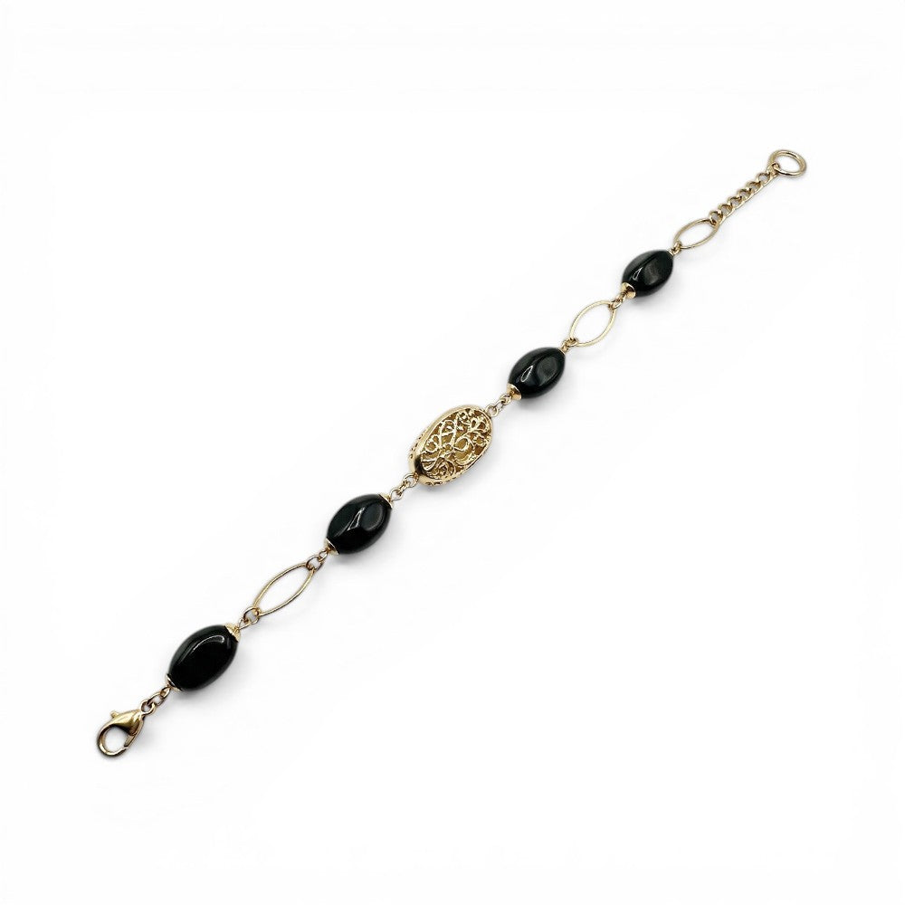 BRACCIALE CON DETTAGLI TRAFORATI