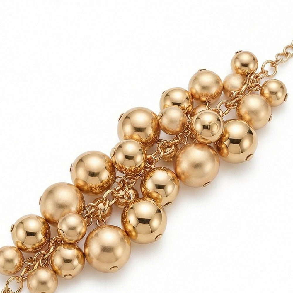 BRACCIALE CON SFERE LUCIDE E SATINATE DI DIVERSE DIMENSIONI