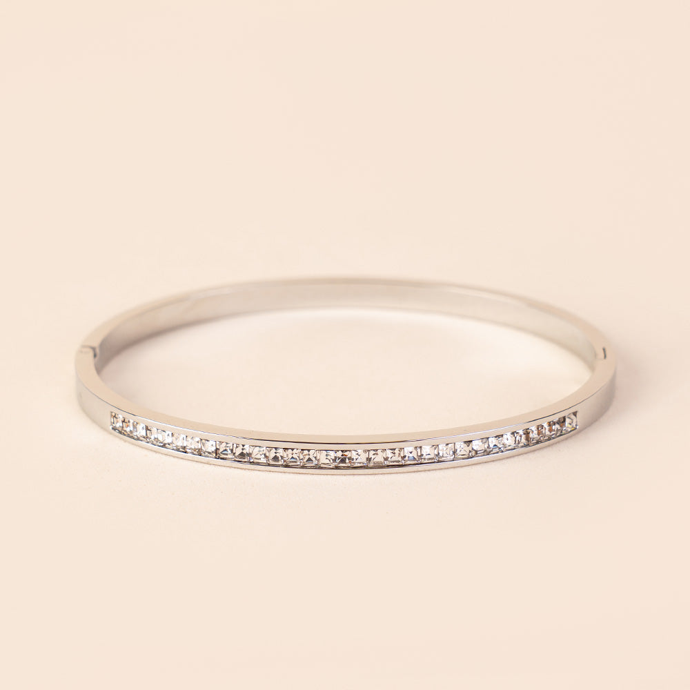 BRACCIALE RIGIDO CON FILA DI STRASS CENTRALE