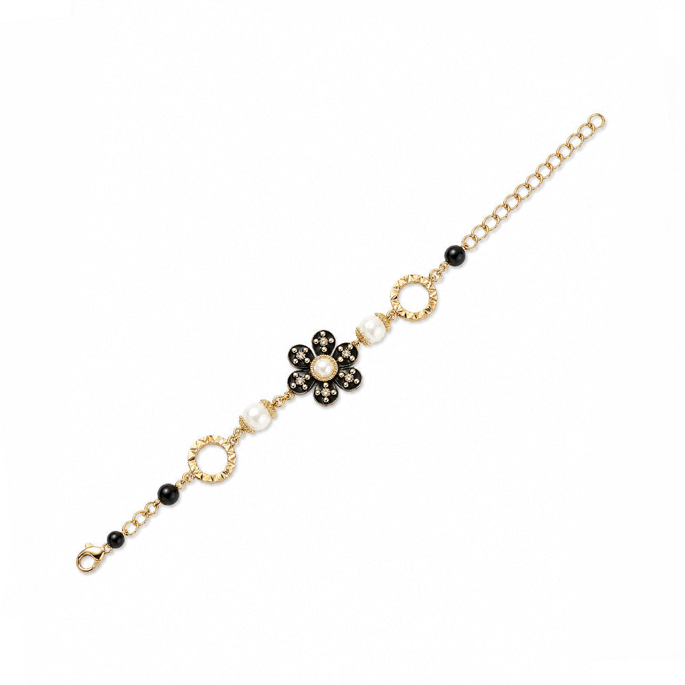 BRACCIALE CON MARGHERITA INSERTI CIRCOLARI E PERLE