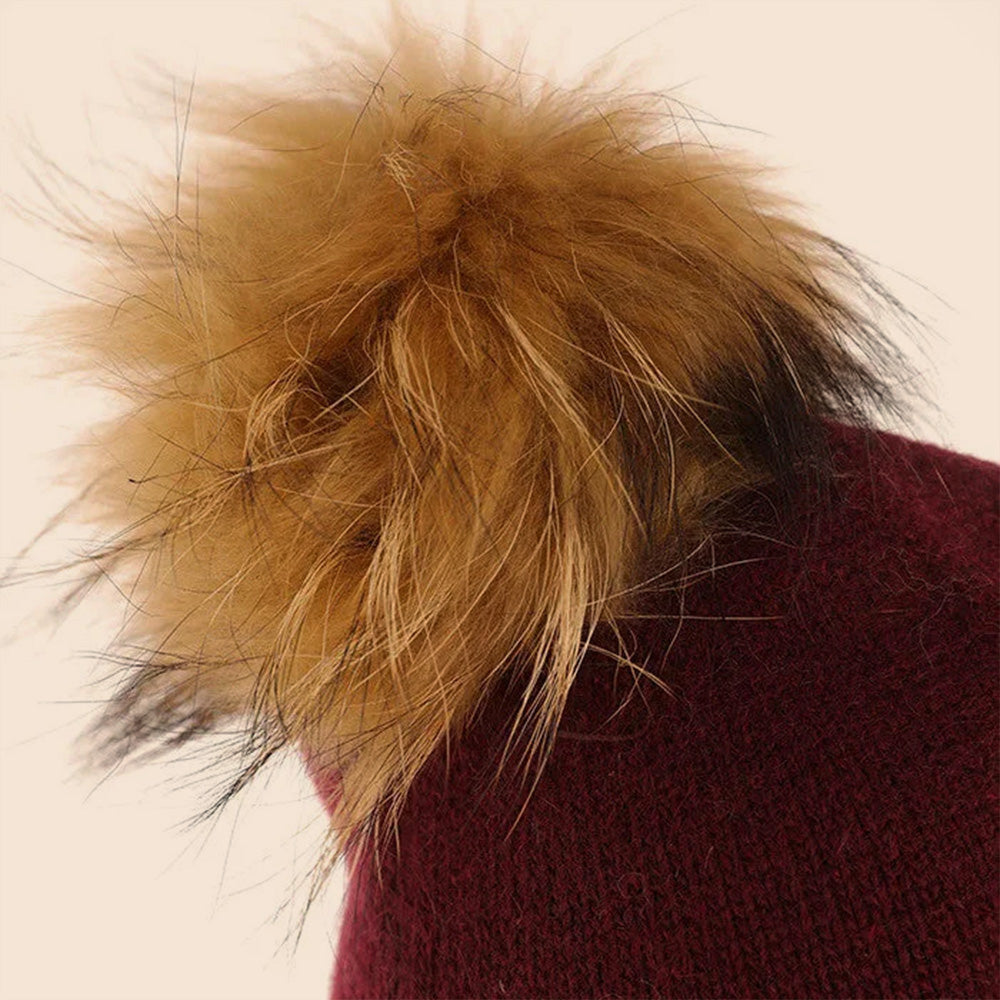 CAPPELLO A CUFFIA CON PON PON IN PELLICCIA