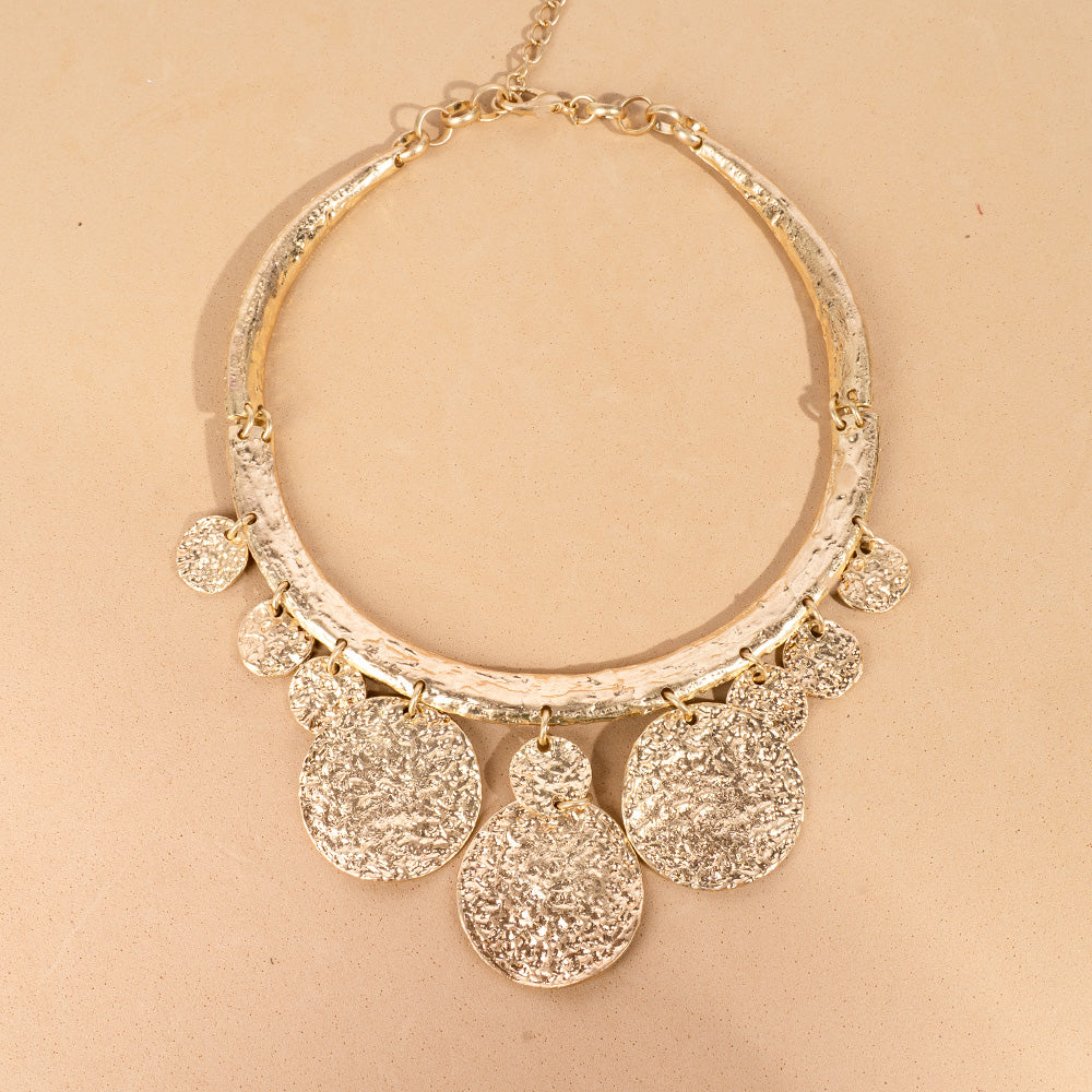 SEMI-RIGID CHOKER NECKLACE WITH ROUND HAMMERED CIRCLES PENDING