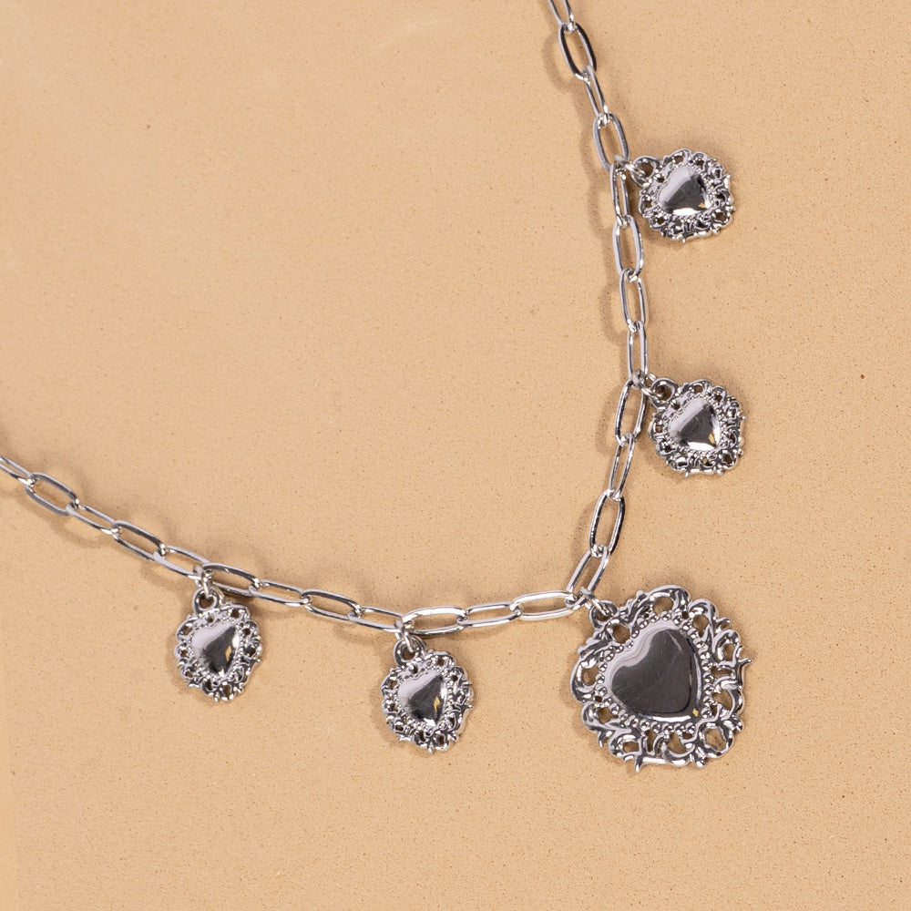 CHOKER NECKLACE WITH FIVE SACRED HEARTS PENDANTS