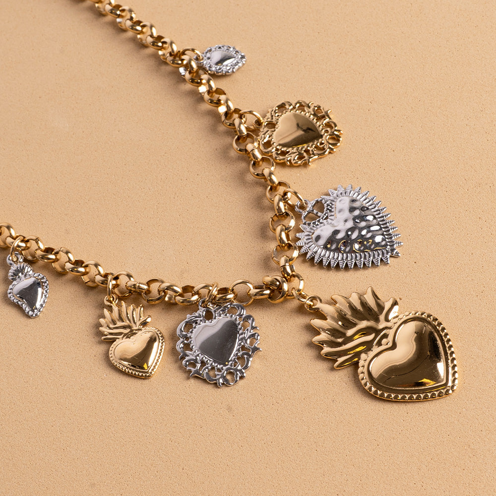 CHOKER NECKLACE WITH SEVEN SACRED HEARTS PENDANTS