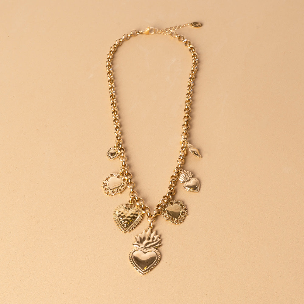 CHOKER NECKLACE WITH SEVEN SACRED HEARTS PENDANTS