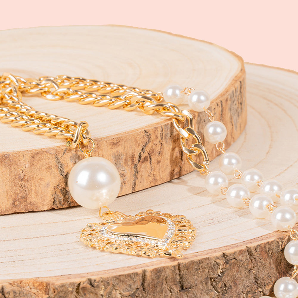 LONG NECKLACE WITH SACRED HEART AND PEARLS