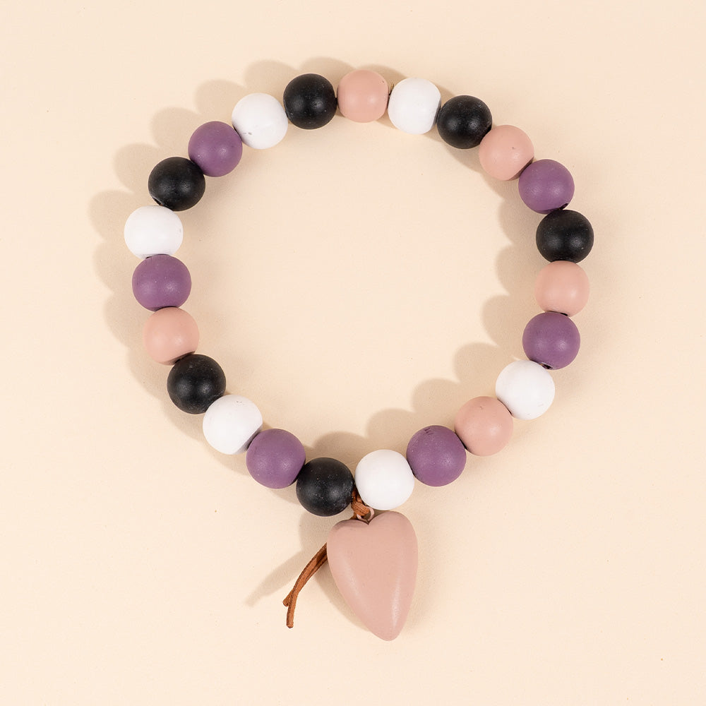 COLLANA ELASTICA CON SFERE E CUORE PENDENTE