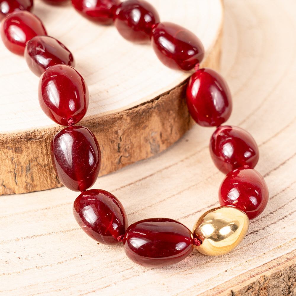 CHOKER NECKLACE WITH ASYMMETRIC COLORED STONES AND GOLDEN DETAIL