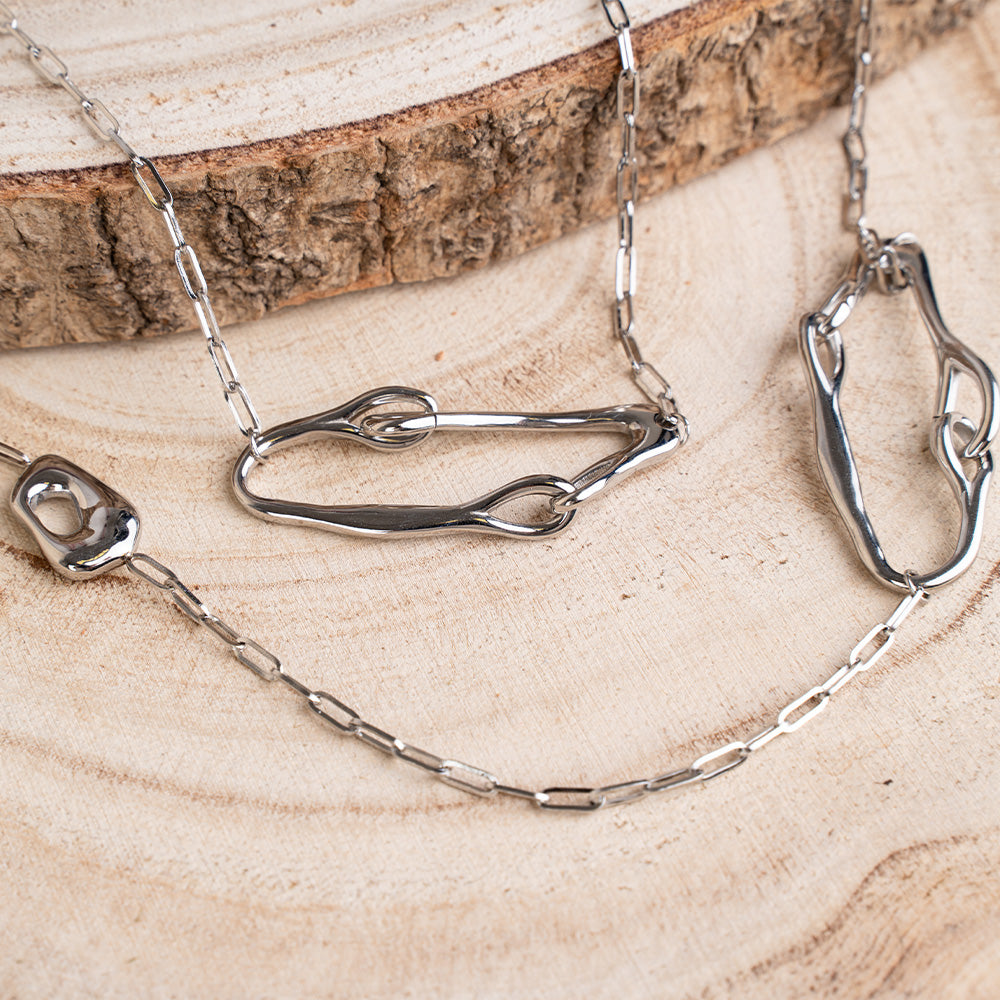 COLLANA LUNGA CON COMPONENTI MINIMALI ASIMMETRICHE