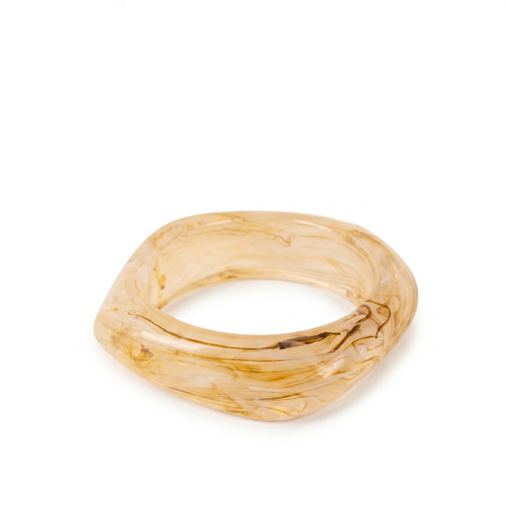 RIGID BRACELET OFTEN WITH AN IRREGULAR SHADE