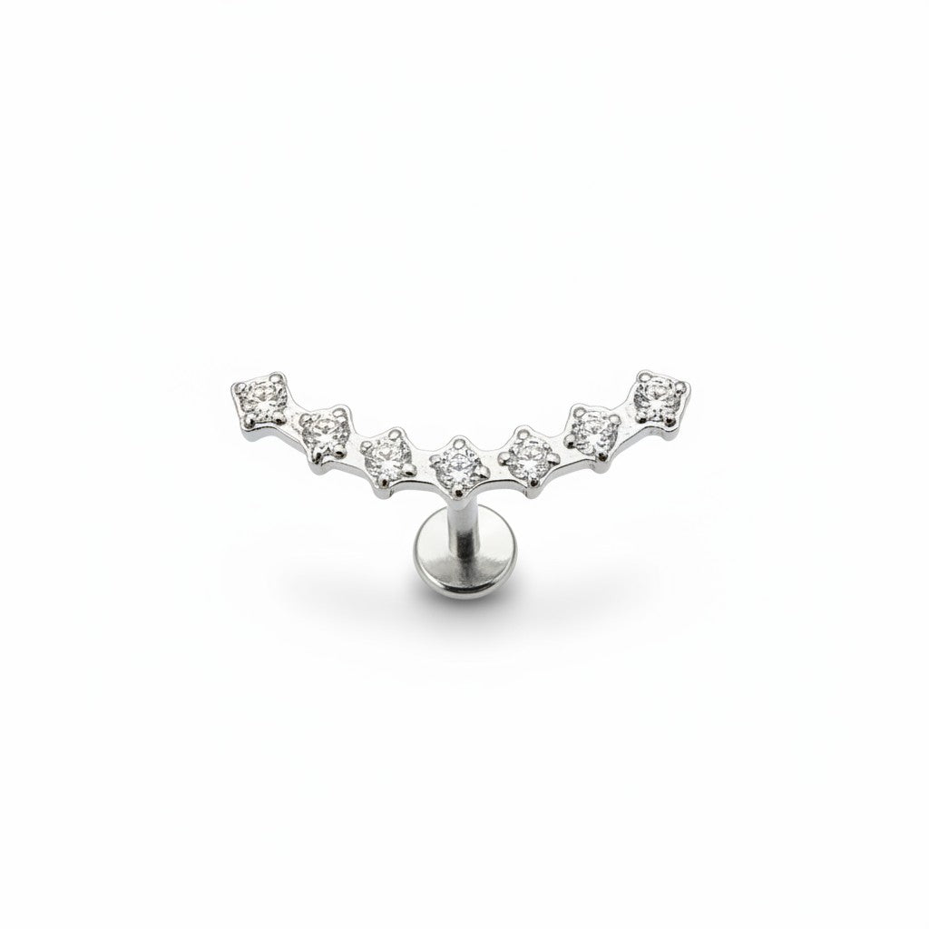 Orecchino piercing Fanatikerie in argento con forma curva decorato da sette luminosi strass incastonati