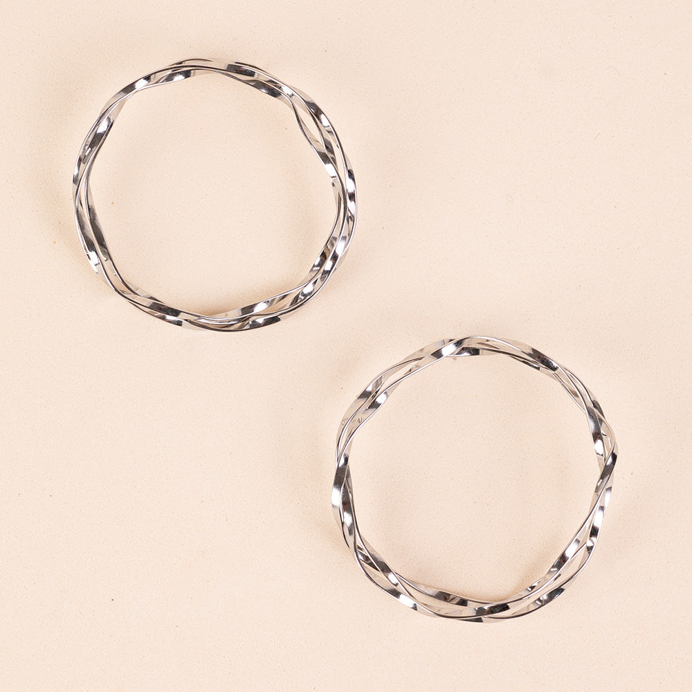 ORECCHINI PENDENTI A CERCHI MARTELLATI