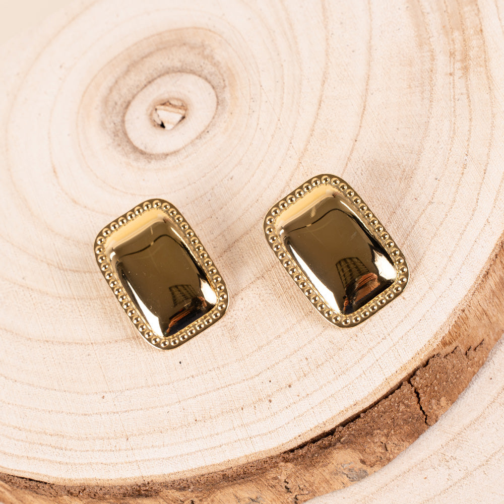 ORECCHINI A RETTANGOLO IN RILIEVO CON CORNICE PUNTINATA