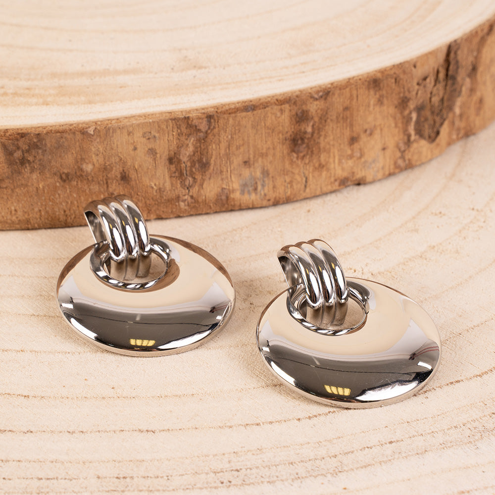 ORECCHINI PENDENTI CON PERNO RIGATO E DISCO ABBOMBATO