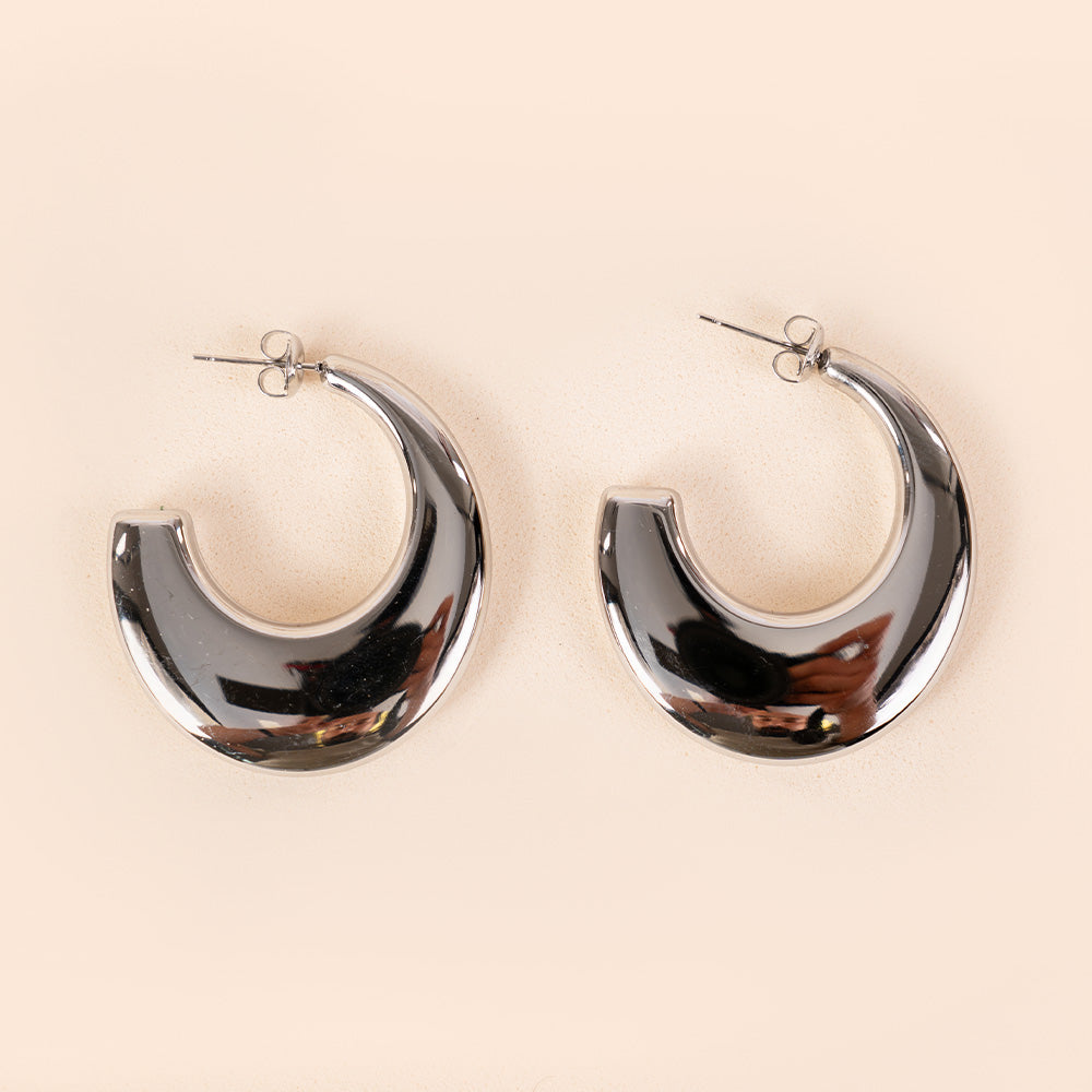 FLAT SEMI-CIRCLE DANGLING EARRINGS WITH INCREASING THICKNESS