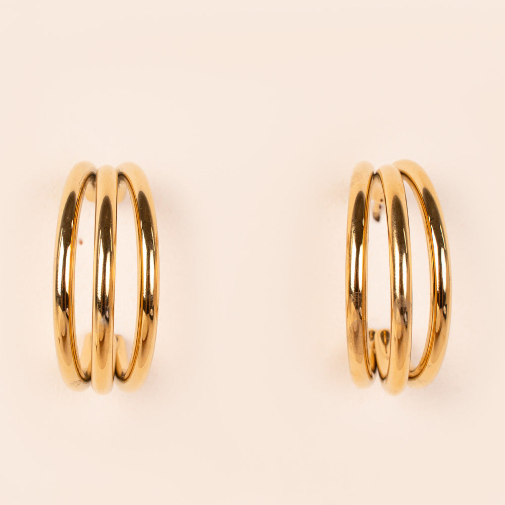 ORECCHINI A SEMICERCHIO CON TRE FASCE INTRECCIATE