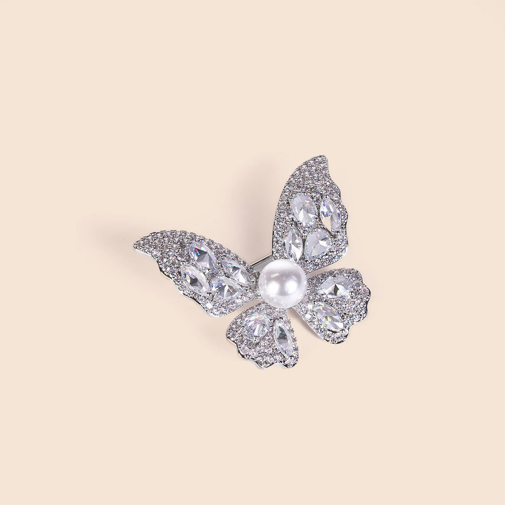 RHINESTONE AND PEARL BROOCH WITH A BUTTERFLY SHAPE
