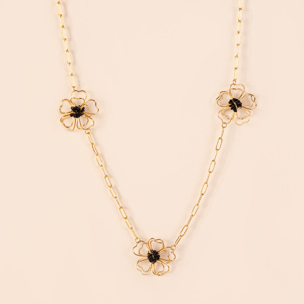 COLLANA LUNGA CON FIORI STILIZZATI