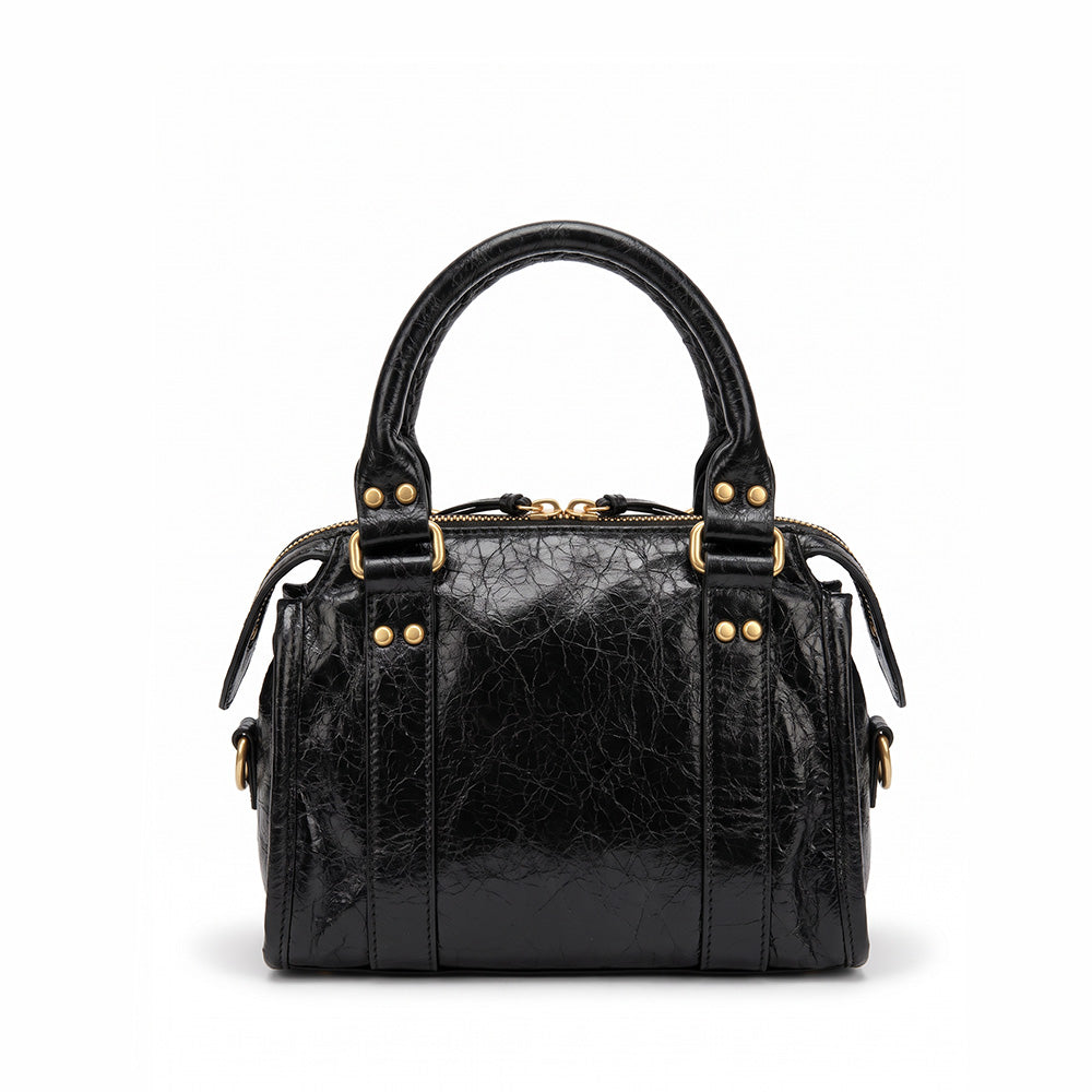 BORSA A MANO CON CHIUSURA A ZIP E STRINGHE DECORATIVE