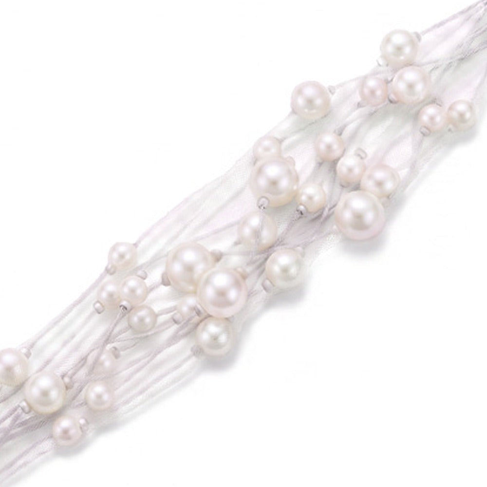 BRACCIALE MORBIDO MULTIFILO CON PERLE