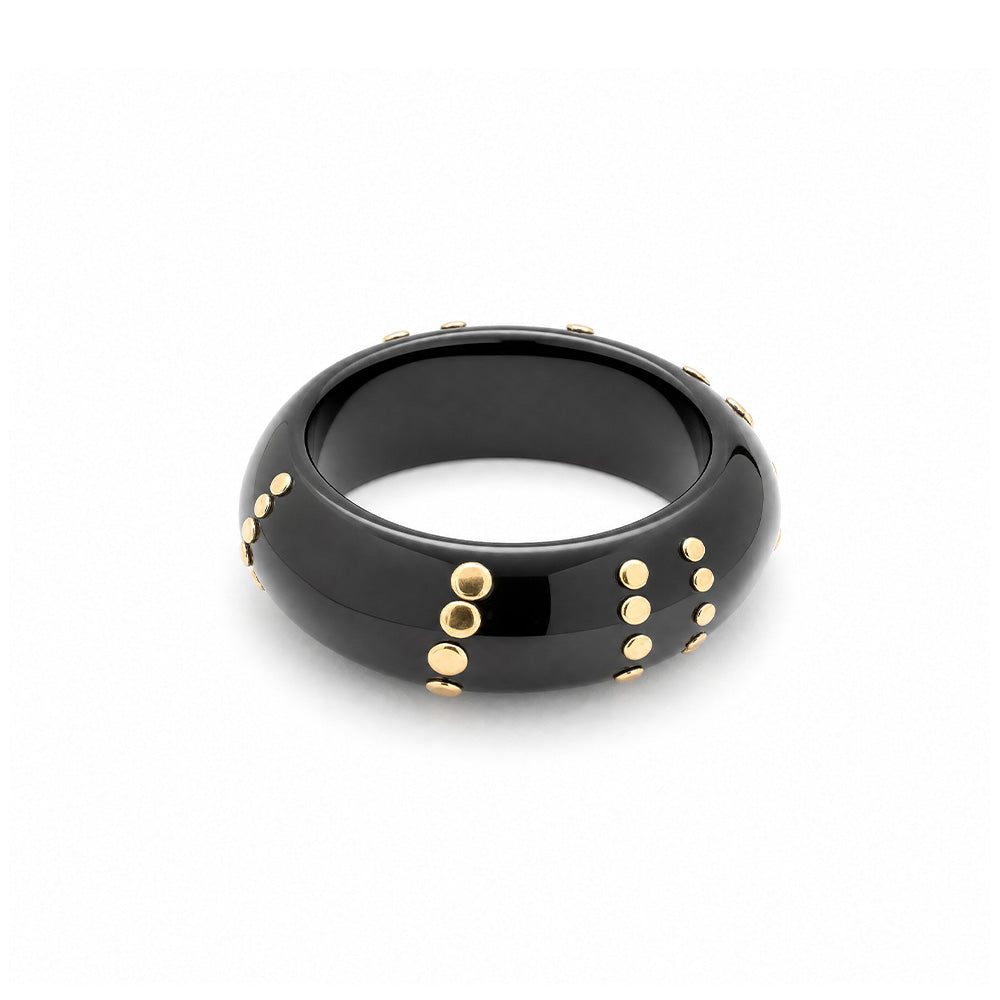 BRACCIALE RIGIDO IRREGOLARE CON FILE DI BORCHIE PIATTE
