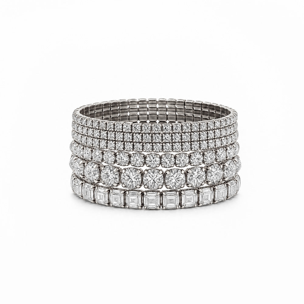 SET DI 9 BRACCIALI ELASTICI CON STRASS DI VARIE DIMENSIONI