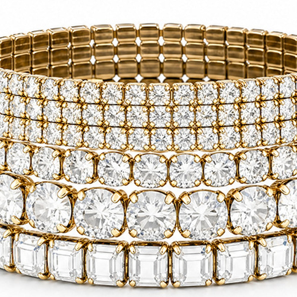 SET DI 9 BRACCIALI ELASTICI CON STRASS DI VARIE DIMENSIONI