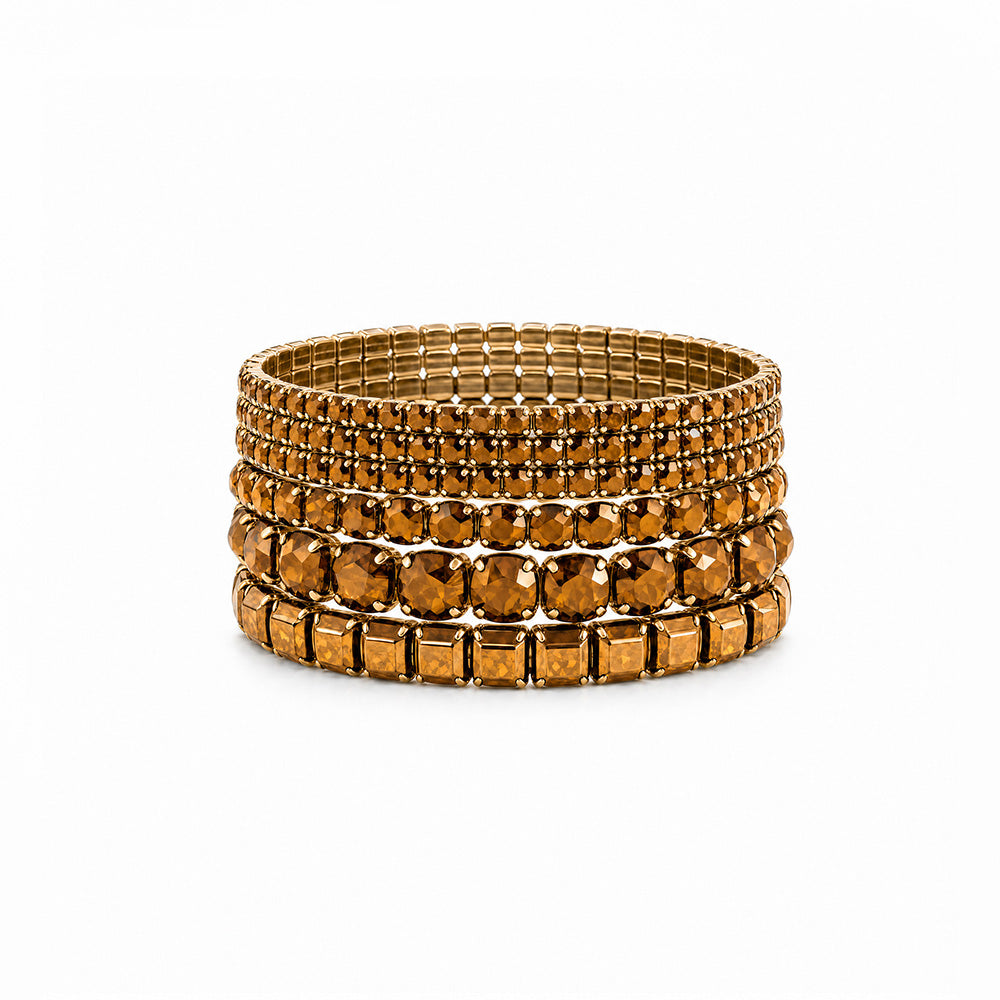 SET DI 9 BRACCIALI ELASTICI CON STRASS DI VARIE DIMENSIONI