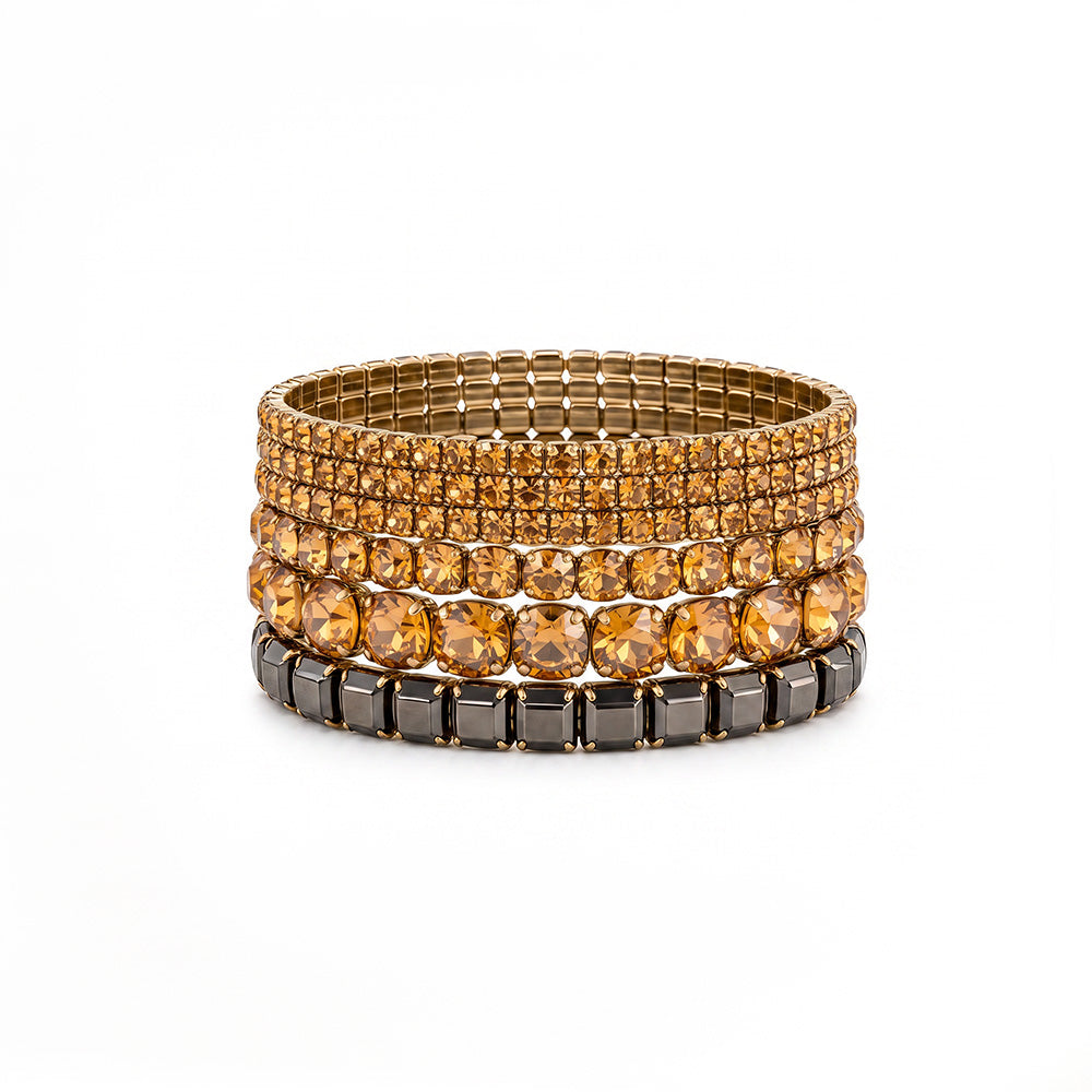 SET DI 9 BRACCIALI ELASTICI CON STRASS DI VARIE DIMENSIONI