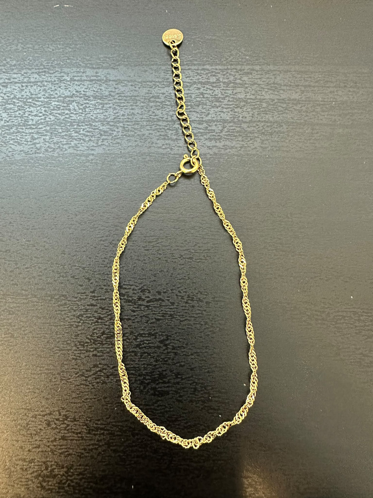 BRACCIALE A MAGLIA RITORTA CON REGOLAZIONE