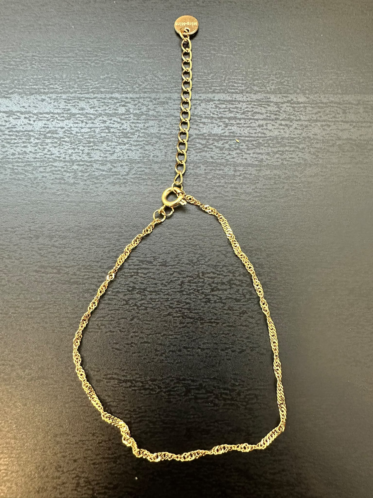 BRACCIALE A MAGLIA RITORTA CON REGOLAZIONE