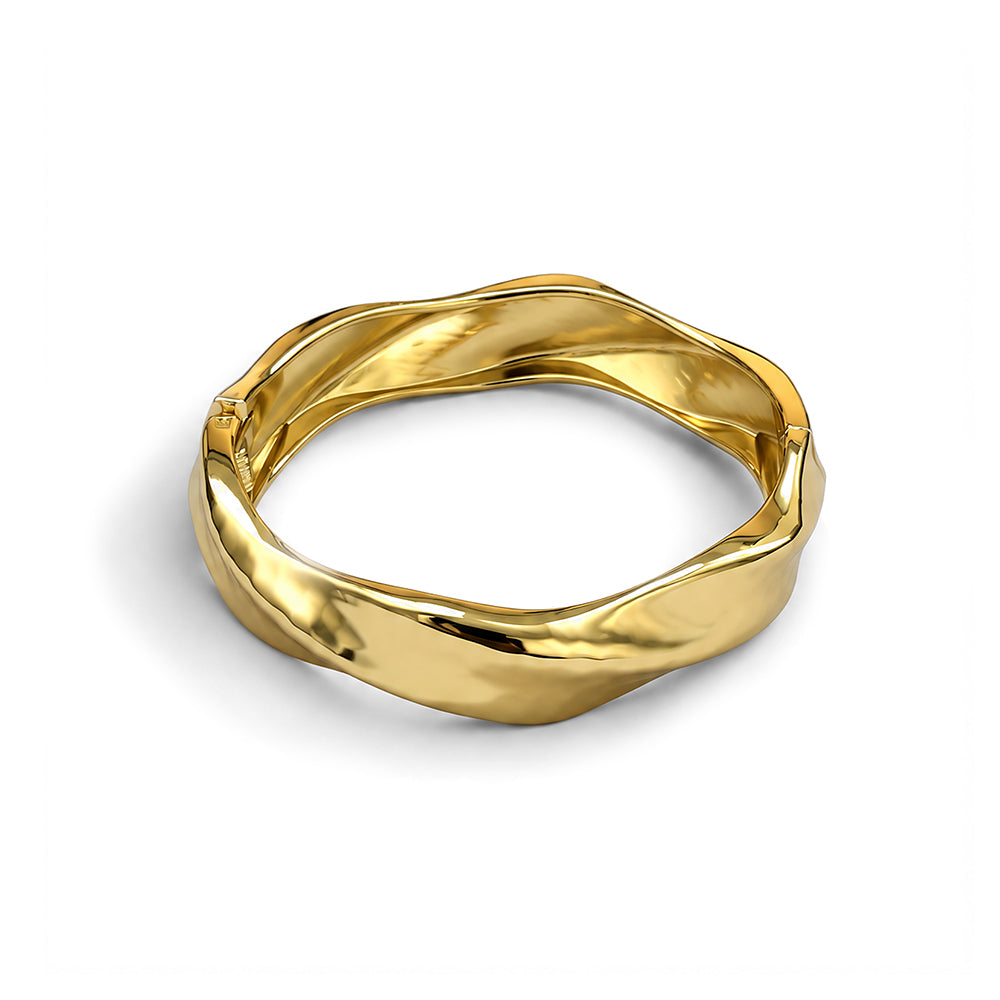 BRACCIALE RIGIDO CON TRAMA MARTELLATA E ANDAMENTO ONDULATO