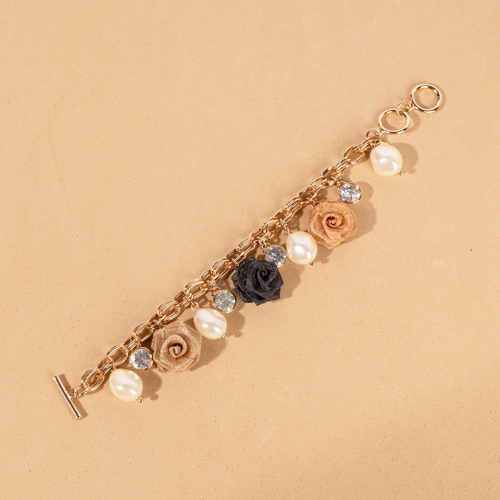 BRACCIALE MORBIDO CON ROSE PERLE E STRASS