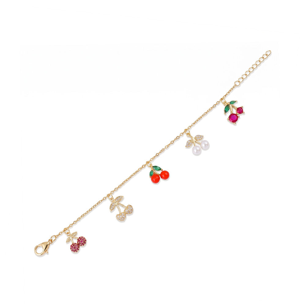 BRACCIALE MORBIDO CON CILIEGIE CON STRASS E PIETRE