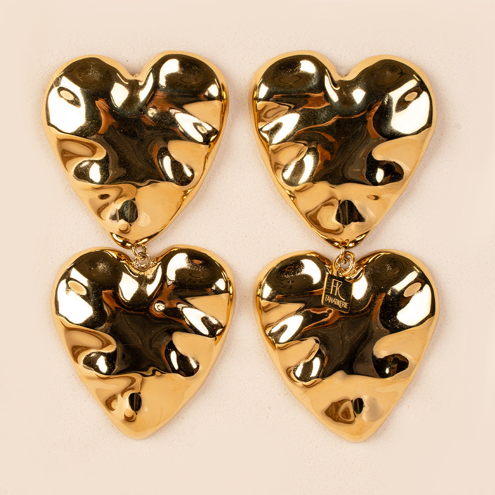 ORECCHINI PENDENTI CON DOPPIO CUORE MARTELLATO