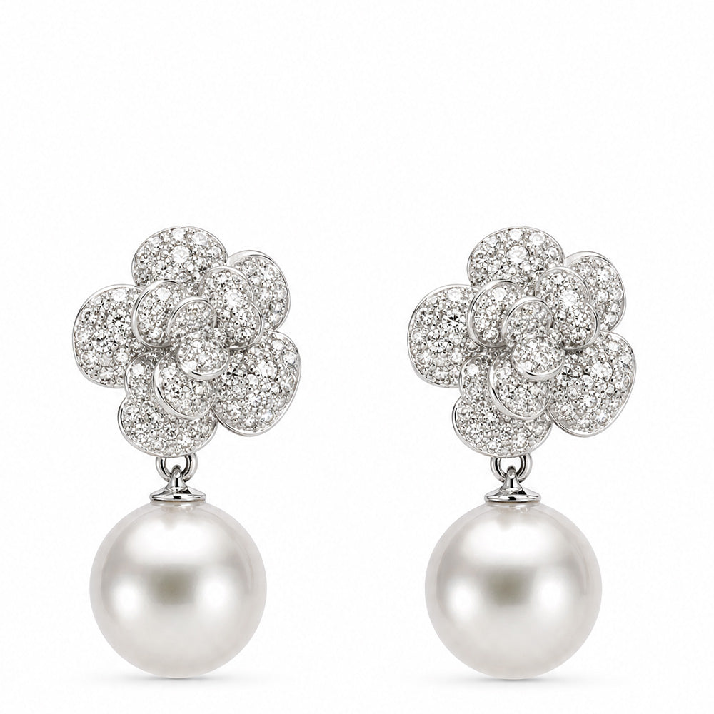 ORECCHINI PENDENTI CON FIORE IN STRASS E PERLA GRANDE